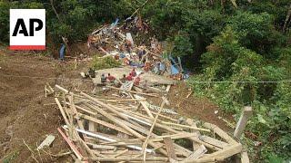Landslides hit Indonesias Sulawesi island killing at least 18 people