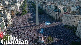 Drone captures sea of fans celebrating in Buenos Aires after Argentinas World Cup win – video