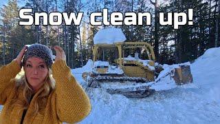 Effortless Winter Cleanup Pushing snow with a Dozer