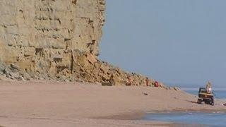 Dorset beach landslide Person thought to be trapped