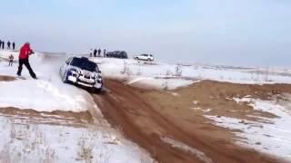 RALLY CRASH OUT IN SNOW