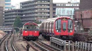 London Underground 1973 Stock racing S Stock into Ravenscourt Park