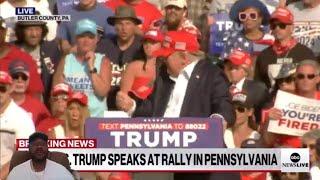 Trumps Secret Service rushes on stage to save him from a assanssination attempt at a rally