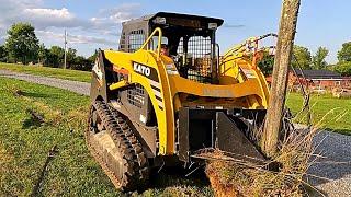 Demolishing An Old Farm Fence. Track Loader VS 100 Year Old Fence Post