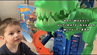 HOT WHEELS ULTIMATE GARAGE WITH T - REX   LINCOLN PLAYS WITH THE ULTIMATE GARAGE WITH T - REX