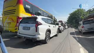Heavy Traffic Gridlock Disrupts Travel On Road Leading To Merak Port