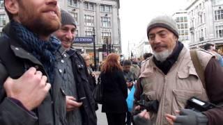 Magnum street photographer Bruce Gilden working in Oxford Street