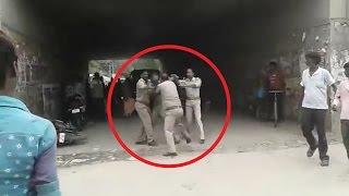 Lucknow Police fighting for bribe share Watch funny video  Oneindia News