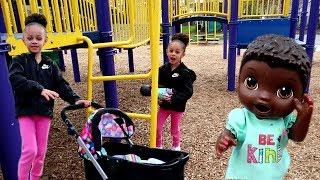 Imani Having Fun at The Playground with Baby Doll