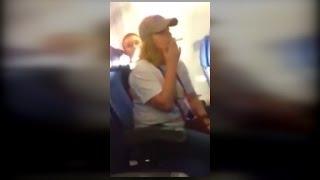 Watch This Woman Smoke A Cigarette on a Plane and Blame the Man Next To Her