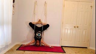 Headstand with support of wall rope  rope Sirsasana