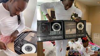 Ace Hood gets emotional when his wife gets him plaques for his Independent music for Christmas