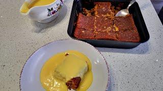 Malva Pudding with custard . Desserts of South Africa.