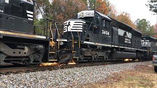 P80 with Extreme Wheel Slip Grinds the Rails While 212 with Interstate Waits to Pass