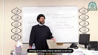 According to Islamic Law sitting on a table on which alcohol is served is forbidden - Qazwini