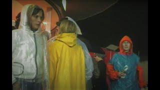 1000 Girls wearing PVC rubber raingear at an openair concert