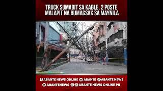 Truck sumabit sa kable 2 poste malapit na bumagsak sa Maynila