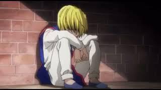 Sad Kurapika sitting in the alley listening to how to save a life from the distance