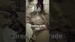 Grade slab breaking