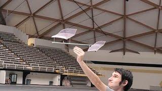 Indoor hand launched glider world record flight in a dust devil