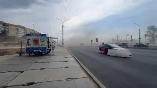 Strong winds in Minsk blow away road barrier and stir dust