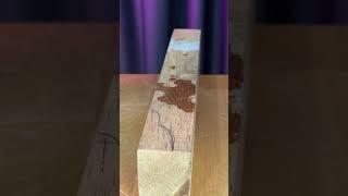 Flattening a warped board with an iron