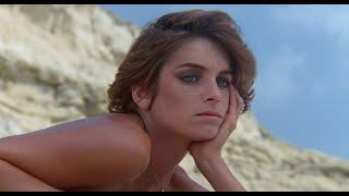 Summer Lovers 1982 - 3 - A beautiful woman on a beach