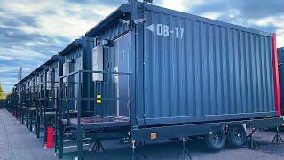 Japan Container Hotel with Trains Passing by