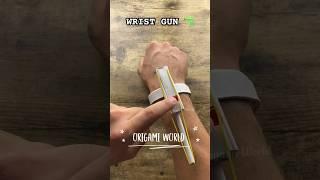 WEAPON PAPER CRAFTING ORIGAMI WORLD WEAPON ART  HOW TO MAKE PAPER SHOOTING WRIST GUN EASY TUTORIAL