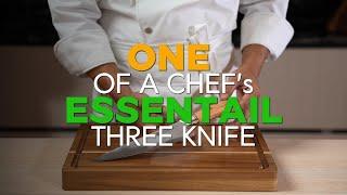 One of a chefs essential three knives.