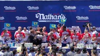 Joey Chestnut Chokes Protestor During Nathans Hot dog Eating Contest 2022