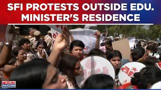 SFI Stages Protest Outside Education Minister Dharmendra Pradhans Residence Over NEET Row