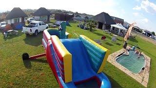 Skydiver Lands On Pirate Bouncy Castle