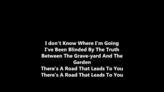 Between the Graveyard and the Garden lyrics - Jason Upton