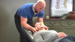 Chiropractic Knee and Spinal Adjustment on a CrossFit Competitor Male Doctor Male Patient