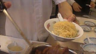 Hong Kong Food. Action in the Kitchen. Preparation of Noodles and Dumplings. Chinese Restaurant