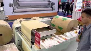 Paper bag machine with D cut punch handle