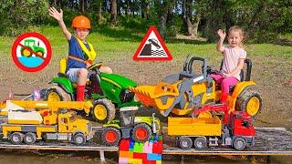 Darius and Francesca build the road and help trucks to stay safe - Kids toys stories