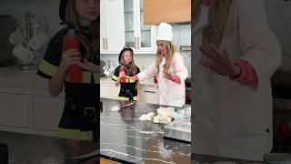 Nastya and Rebecca Zamolo pretend to play firefighter