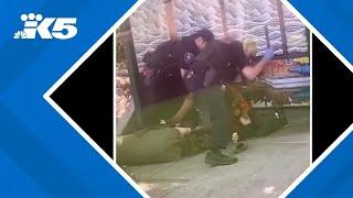 EXCLUSIVE Video shows Seattle police officers beating man with batons at bus stop