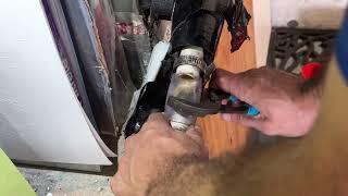 How to clean out the drain Line on a Rheem AC Air Handler