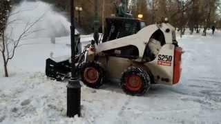 Bobcat S250 with Snow remover