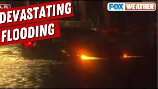 Watch Tampa Residents Push Car Into Hurricane Helene Floodwater