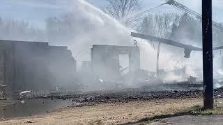 Firefighters respond to a fire at the former Nightingale Lanes building