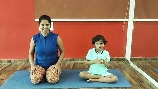 Mother and son partner yoga poses at Artis yoga at health1st