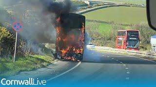 Watch dramatic moment bus bursts into flames on A30 in Cornwall
