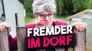 Fremder im Dorf.