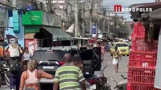 Flávio Dino desembarcando no Complexo da Maré