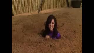 superheroine got trapped in the quicksand trap