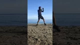 5 am boxing drill practice in the Adriatic sea Italy